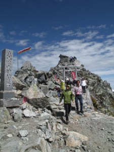 a-hikers-pay-their-respects-at-tate-yama-jinja-japan